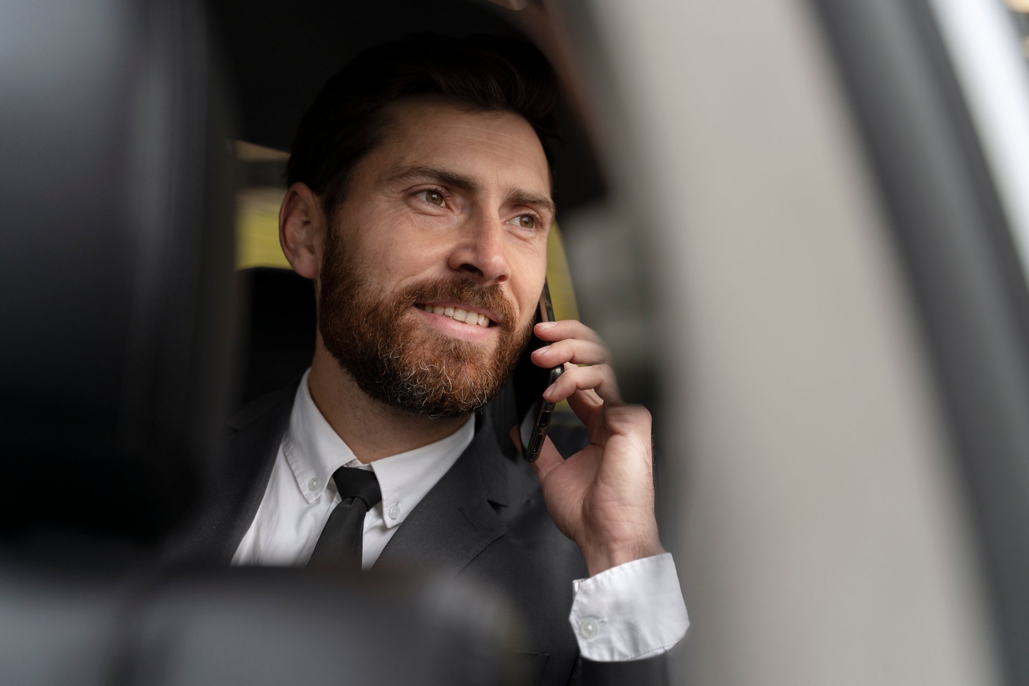 handsome-man-sitting-back-cab